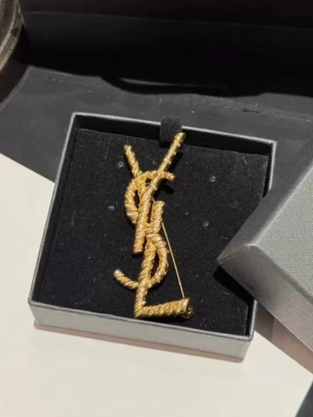 Saint Laurent brooch